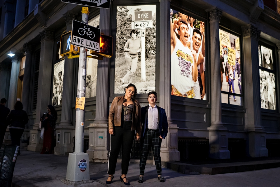 A lesbian couple stand in front of the leslie-lohman museum before their wedding ceremony.